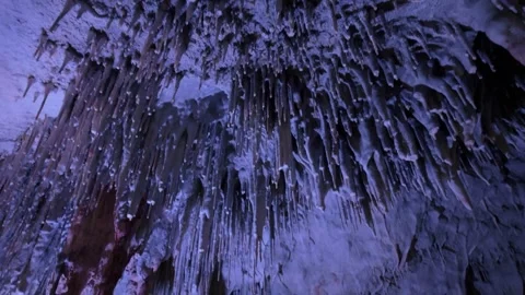 Blue icicles on a frozen cave ceiling Stock Footage 344651003