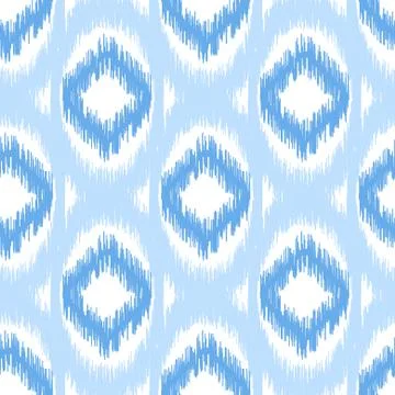 Blue ikat seamless vector pattern. Textile fabric design Stock Illustration