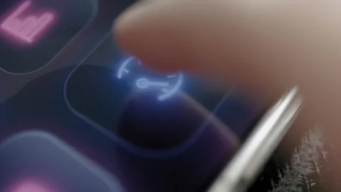 Blue illuminated speedometer icon on a smartphone dashboard represents Stock Footage 342487618