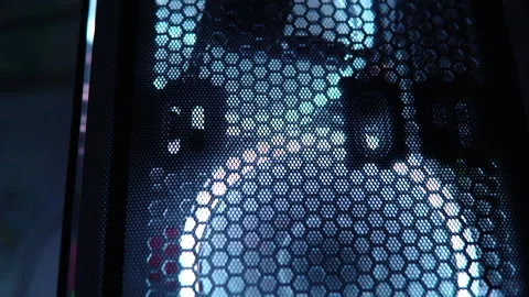 Blue illumination of the fan in the pc case. The gaming pc glows in the dark. Stock Footage 161264414