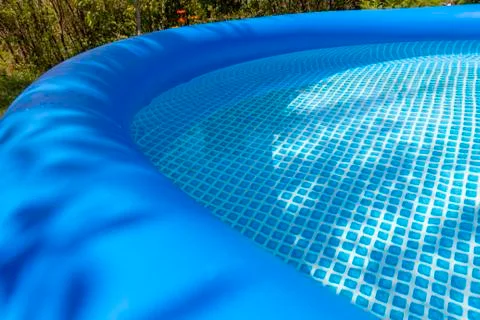 Blue inflatable pool Stock Photos