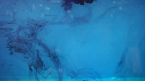 Blue ink dissolving into water, close shot. Video stock 150396054