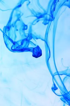Blue Ink Drop Dynamic Motion in Water. Abstract Background Stock Photos