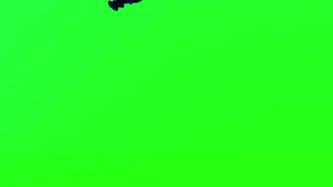 Blue ink flows on green background Stock Footage 89955779