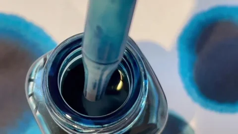 Blue Ink Pot Close up 1 Stock Footage 252019645