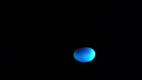 Blue Ink Sphere Submerged Underwater On Black Background Stock Footage 339301265