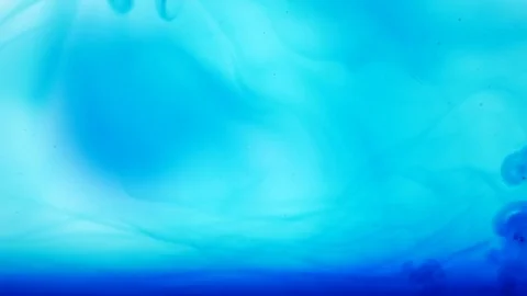 Blue ink in water. On a blue background Video stock 74600367