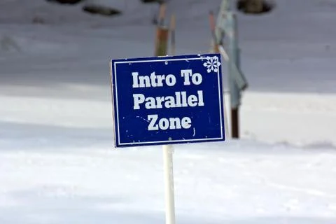 Blue Intro to Parallel Zone Sign on the Ski Slopes Stock Photos