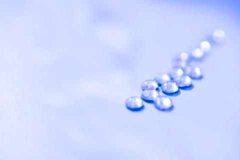 Blue isolated crystals on the plain background with the side light Foto stock