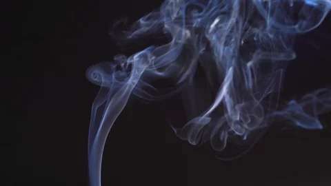 Blue isolated smoke on a black background. The mist is moving up, color of the Stock Footage 124723691