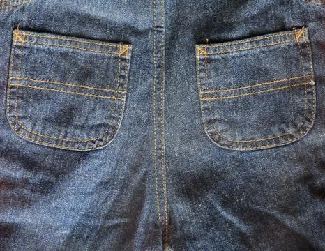 Blue jeans with back pockets Stock Photos