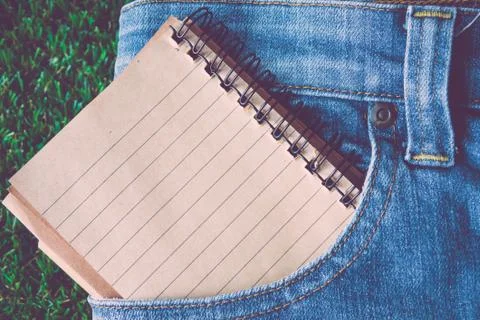 Blue jeans  notebook. Stock Photos