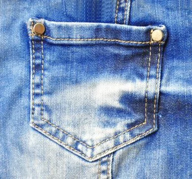 Blue jeans with pocket closeup Stock Photos