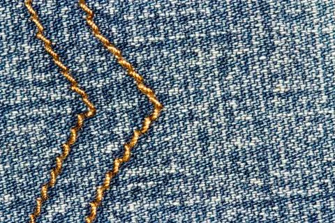 Blue jeans texture background and seam for text area Stock Photos