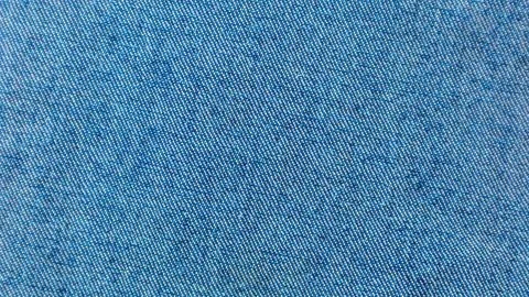 Blue jeans texture as a background Stock Photos
