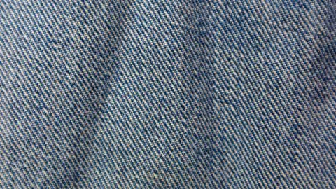 Blue jeans texture as a background Stock Photos