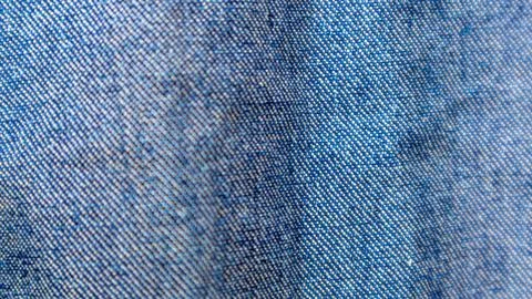 Blue jeans texture as a background Stock Photos