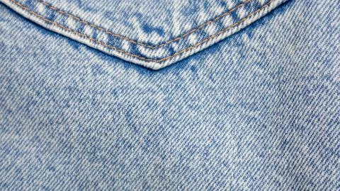 Blue jeans texture as a background Stock Photos