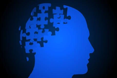 Blue jigsaw head with missing pieces Stock Illustration