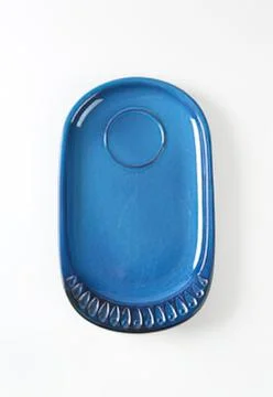 Blue keychain fob with circular button Stock Photos