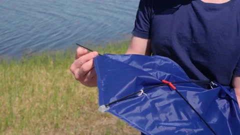 Blue kite soars in the blue sky. Stock Footage 155300227