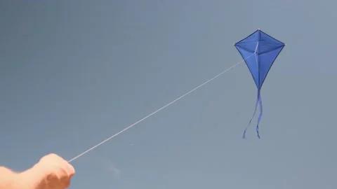 Blue kite soars in the blue sky. Stock Footage 155300265