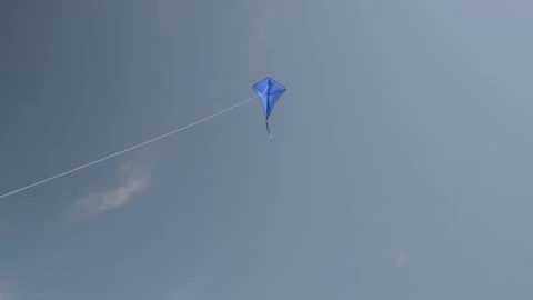 A blue kite soars in the sky Stock Footage 155300038