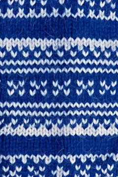 Blue knitting background Knitting background of handmade woolen pattern Co... Stock Photos