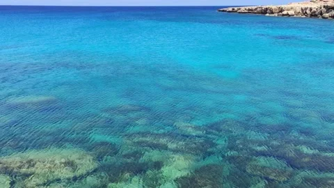Blue lagoon and rocks Stock Footage 239190128