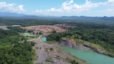 Blue Lake, a former mining site and barren area on the island of Kalimantan.. Stock Footage 322955712