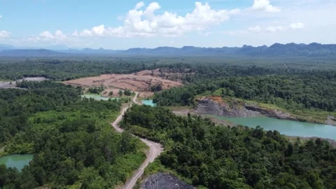 Blue Lake, a former mining site and barren area on the island of Kalimantan.. Stock Footage 322955713