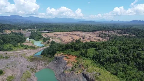 Blue Lake, a former mining site and barren area on the island of Kalimantan.. Stock Footage 322955987