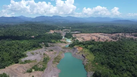 Blue Lake, a former mining site and barren area on the island of Kalimantan.. Stock Footage 322956007
