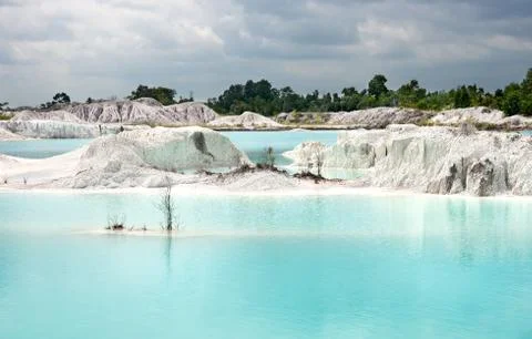 Blue lake Kaolin and white land containing kaolinite in Belitung. Stock Photos