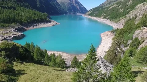 Blue lake in mountain valley Stock Footage 79755172