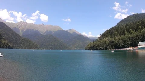 Blue Lake with Mountain View Stock Footage 104518420