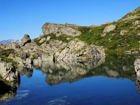 Blue lake in the mountains Stock Photos