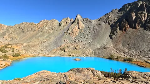 Blue lake - pan left Video stock 286057296