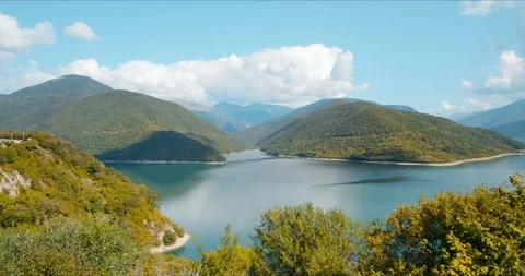 A blue lake surrounded by mountains. Stock Footage 121634950