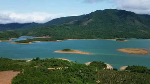Blue Lake Surrounded by Mountains Stock Footage 322822975