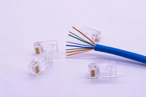 Blue LAN cable Cat6 with eight inner wires visible Foto stock