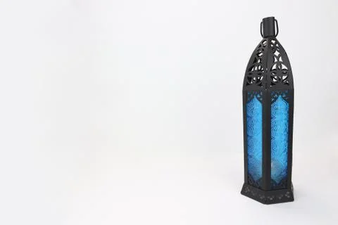 Blue lantern against white background Stock Photos