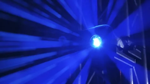 Blue Laser Projector Close-Up Emitting Light Beams into Camera Lens Stock Footage 335951768