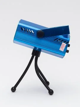 Blue laser stage light projector on tripod Stock Photos