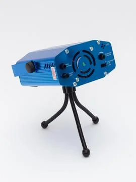 Blue laser stage light projector on tripod Stock Photos