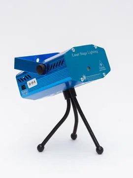 Blue laser stage light projector on tripod Stock Photos