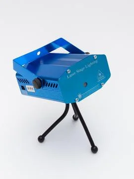 Blue laser stage light projector on tripod Stock Photos