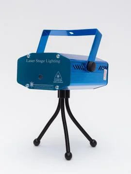 Blue laser stage light projector on tripod Stock Photos