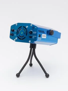 Blue laser stage light projector on tripod Stock Photos
