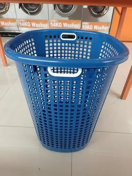 Blue laundry basket Stock Photos